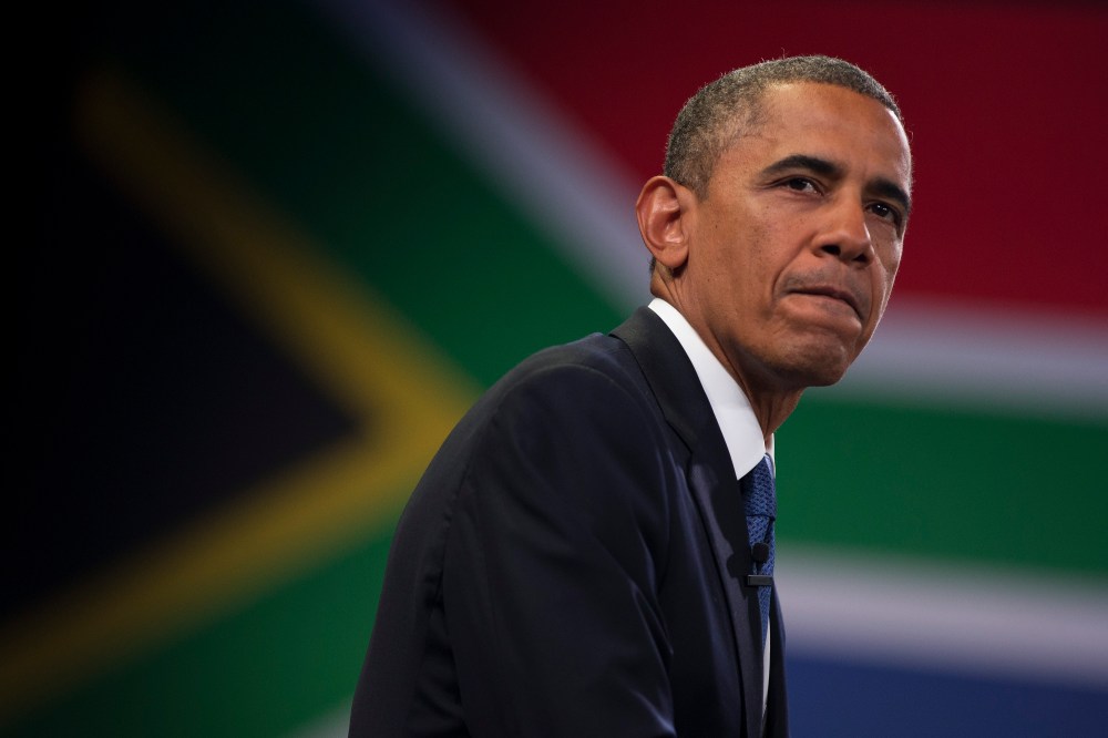 U.S. President Barack Obama pauses during a town hall meeting with young African leaders at the University of Johannesburg Soweto on Saturday, June 29, 2013, in Johannesburg, South Africa. (AP Photo/Evan Vucci)