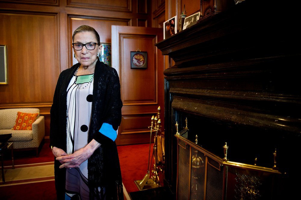 Associate Justice Ruth Bader Ginsburg poses in her Supreme Court chambers in Washington, July 31, 2014. (Photo by Cliff Owen/AP)