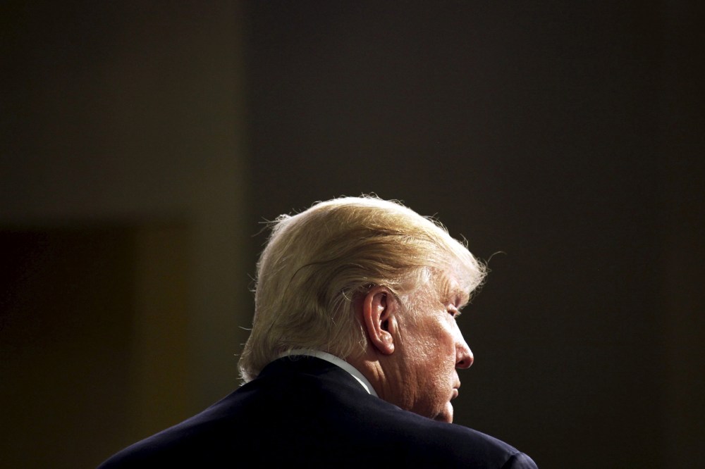 Republican Presidential candidates Donald Trump takes interviews in the spin room after the debate held by Fox Business Network for the top 2016 U.S. Republican candidates in Milwaukee, Wis., Nov. 10, 2015. (Photo by Darren Hauck/Reuters)