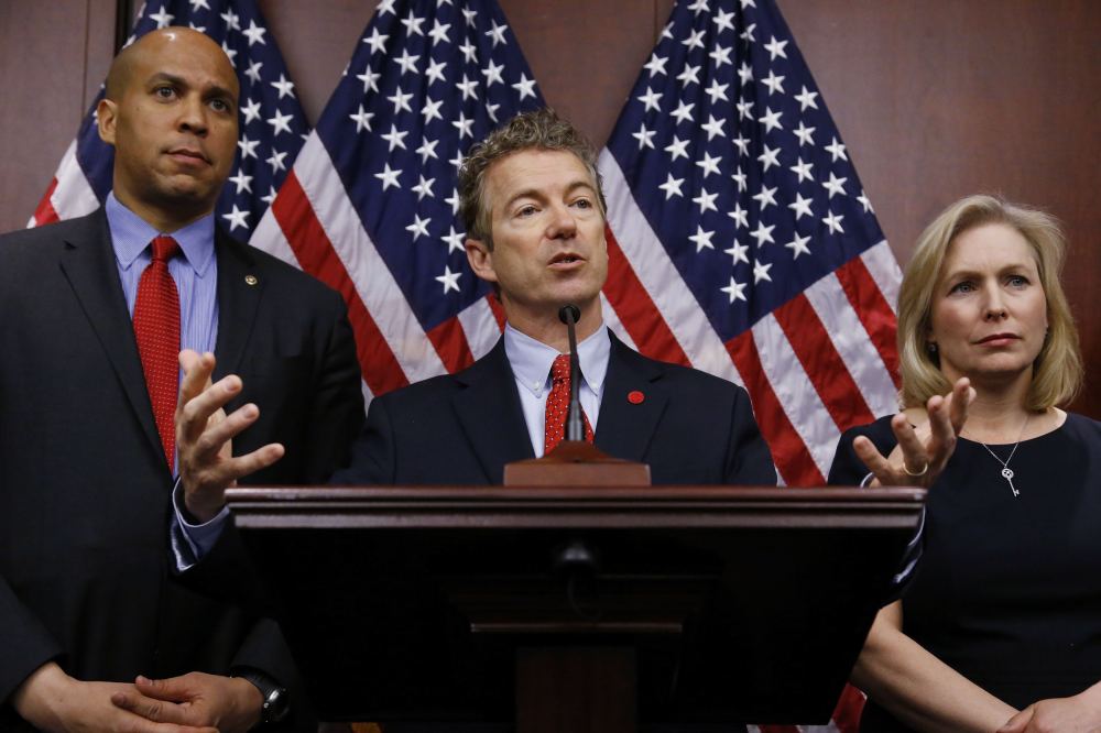 Booker, Paul and Gillibrand hold a news conference to introduce legislation that would prevent the federal government from prosecuting medical marijuana users in states where it is legal, at the U.S. Capitol in Washington