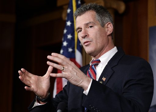 Sen. Scott Brown, R-Mass., speaks during a media availability, on Capitol Hill Tuesday, Nov. 13, 2012, in Washington. (Photo by Alex Brandon/AP)