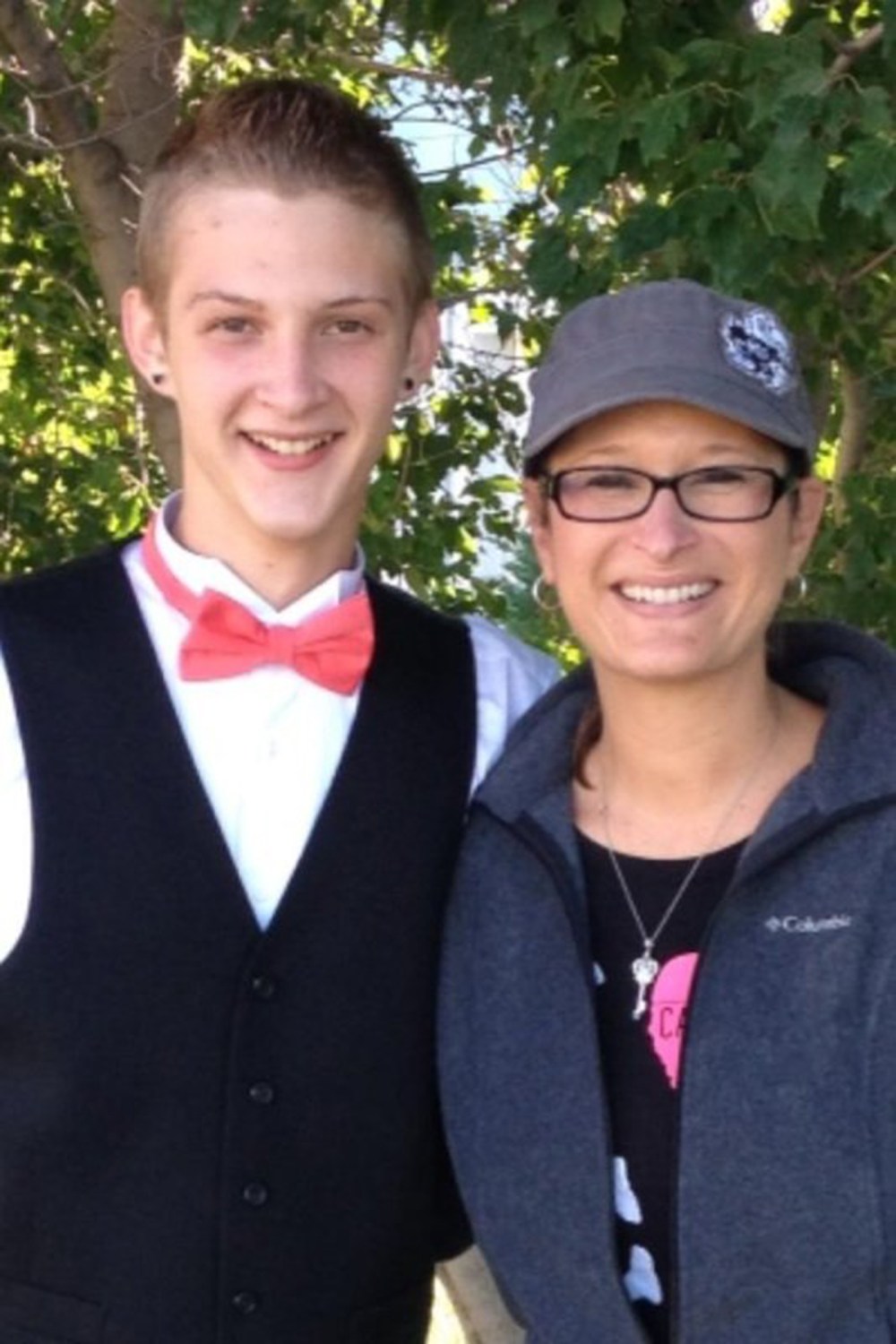17-year-old Bryce Masters stands with his mother in an undated family photo.