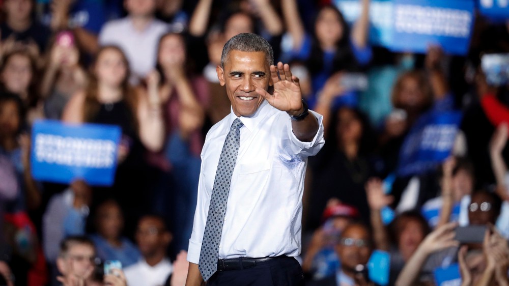 President Barack Obama waves to the crowd at a campaign event for Democratic presidential candidate Hillary Clinton at Capital University, Nov. 1, 2016, in Columbus, Ohio. (Photo by John Minchillo/AP)