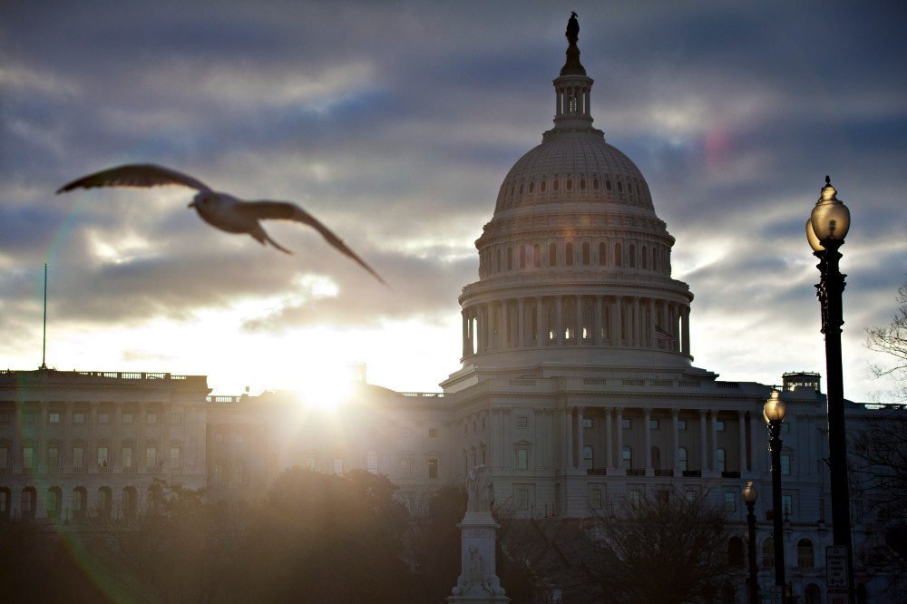FILE In this March 7, 2013, file photo the sun breaks through clouds over the U.S. Capitol in Washington. Daylight-saving time begins at 2 a.m. Sunday, March 10, 2013, when clocks officially move ahead an hour. (AP Photo/J. Scott Applewhite, File)