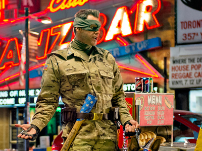 Jim Carrey playing the role of "Col. Stars and Stripes" in "Kick-Ass 2."  (Photo by Daniel Smith/Universal Pictures/AP)