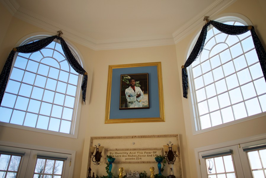 Above the mantlepiece hangs a portrait of Dr. Benjamin Carson at his residence in Upperco, Md. on Nov. 27, 2014. (Photo by Mark Makela)