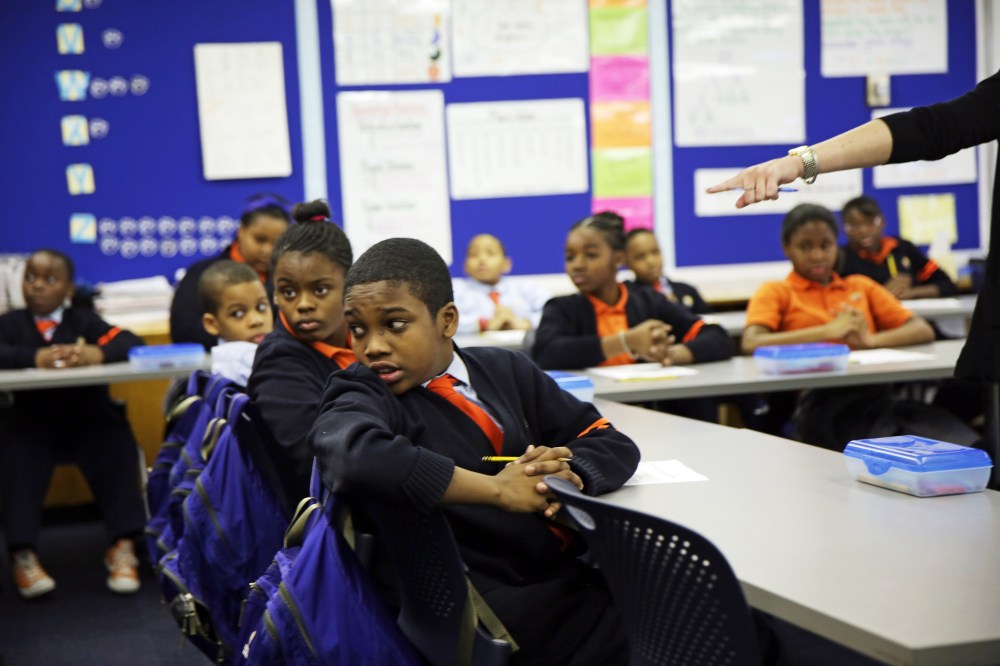 Six graders attend a math class at Success Academy Middle School in Harlem Monday, March 3, 2014.