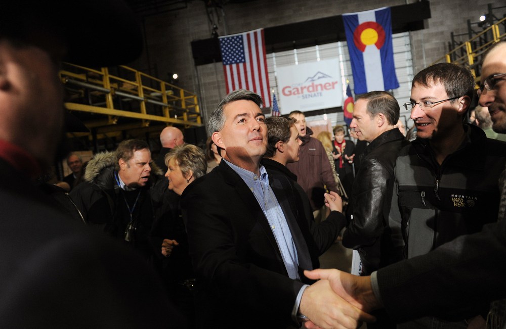 Colorado Republican Congressman Cory Gardner shakes hands with supporters in Denver on Saturday, March 1, 2014.