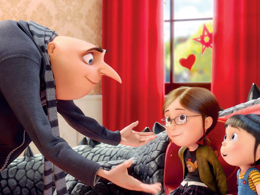 (L - R) Gru (STEVE CARELL) talks with Margo (MIRANDA COSGROVE) and Agnes (ELSIE FISHER) (Courtesy of Universal Pictures)
