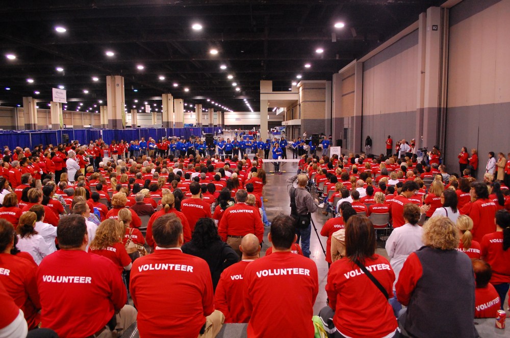 Volunteers wait for instructions at one of the National Association of Free and Charitable Clinics events