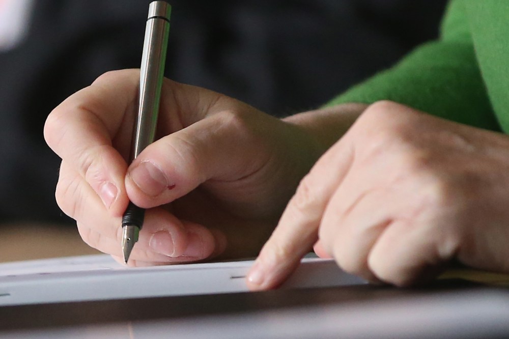 Writing. (Photo by Sean Gallup/Getty)