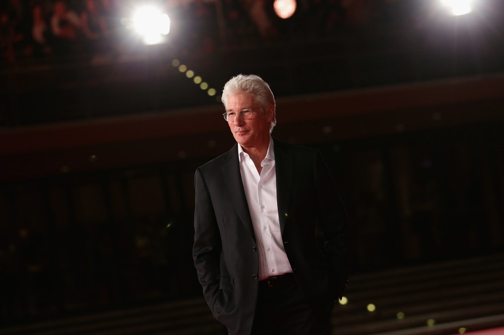 Richard Gere walks on the red carpet during the 9th Rome Film Festival on Oct. 19, 2014 in Rome, Italy. (Photo by Vittorio Zunino Celotto/Getty)