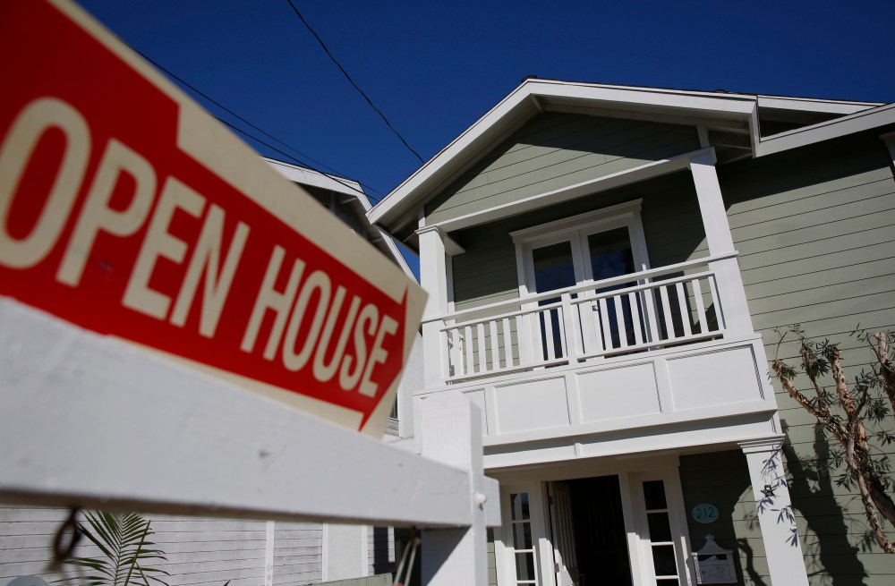 Open House signage is displayed outside of a home for sale in Redondo Beach, Calif., Feb. 14, 2015. (Photo by Patrick T. Fallon/Bloomberg via Getty)