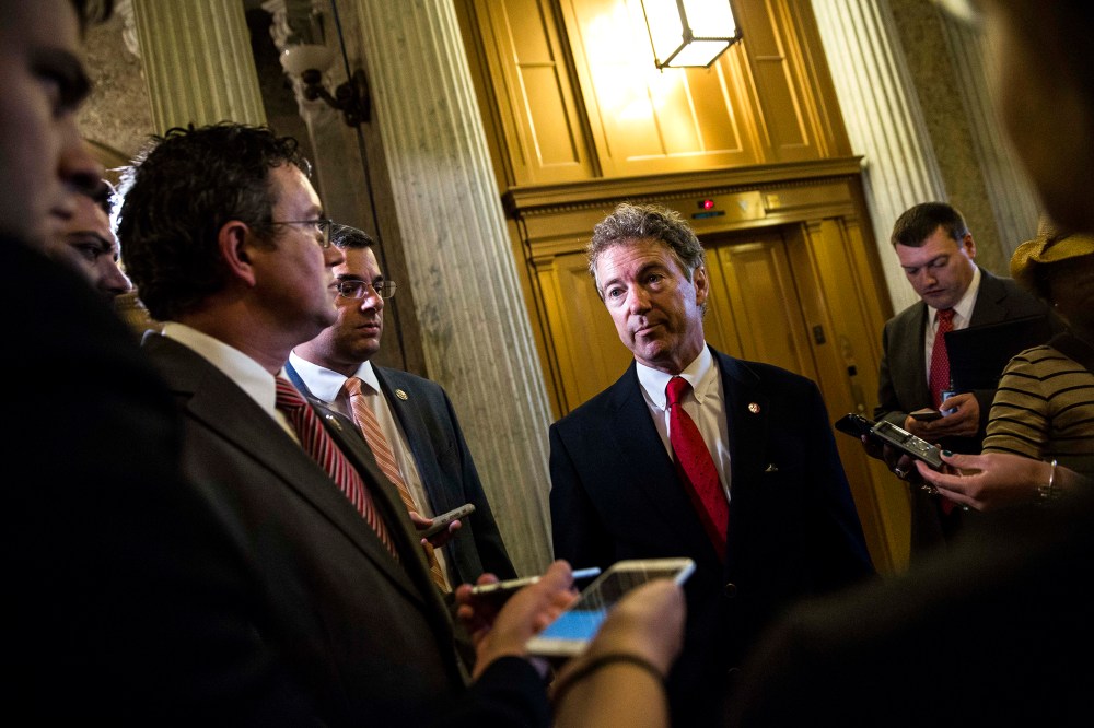 Sen. Rand Paul (R-KY), after speaking on the Senate floor about surveillance legislation, speaks to reporters after exiting the Senate floor on Capitol Hill, May 31, 2015 in Washington, D.C. (Photo by Drew Angerer/Getty)