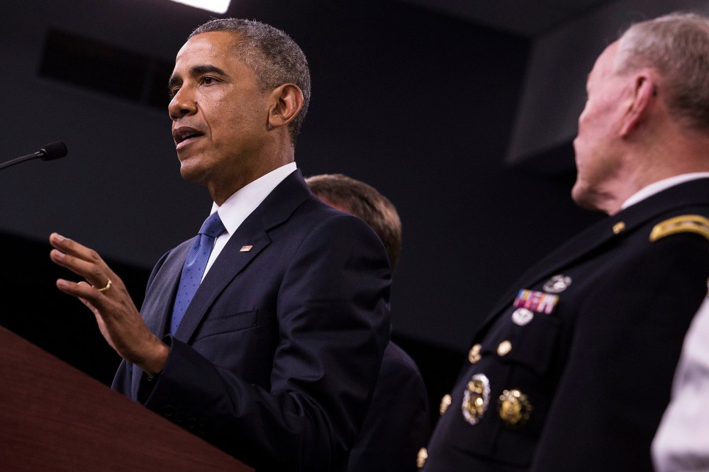 U.S. President Barack Obama, left, speaks during a news conference with General Martin Dempsey, chairman of the Joint Chiefs of Staff, at the Pentagon in Arlington, Va. on July 6, 2015. (Photo by Drew Angerer/Bloomberg/Getty)