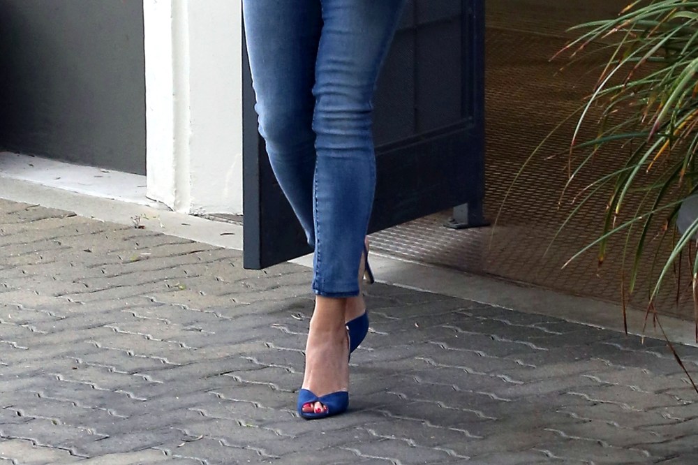 A woman walks in skinny jeans. (Photo by Bauer-Griffin/GC Images/Getty)