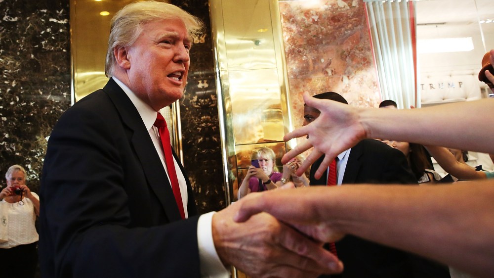 Presidential Candidate Donald Trump Greets A Crowd After Taping TV Interview on July 22, 2015. (Photo by Spencer Platt/Getty).