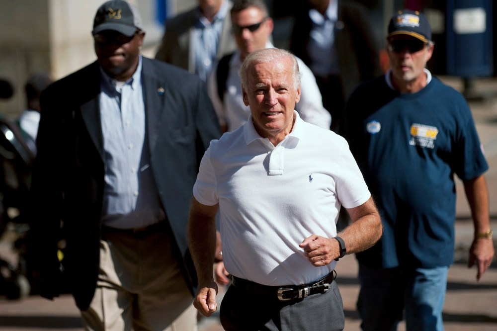 Vice President Joe Biden runs while participating in the annual Allegheny County Labor Day Parade, Sep. 7, 2015 in Pittsburgh, Penn. Biden has been subject of speculation about whether he will run for the U.S. presidency. (Photo by Jeff Swensen/Getty)