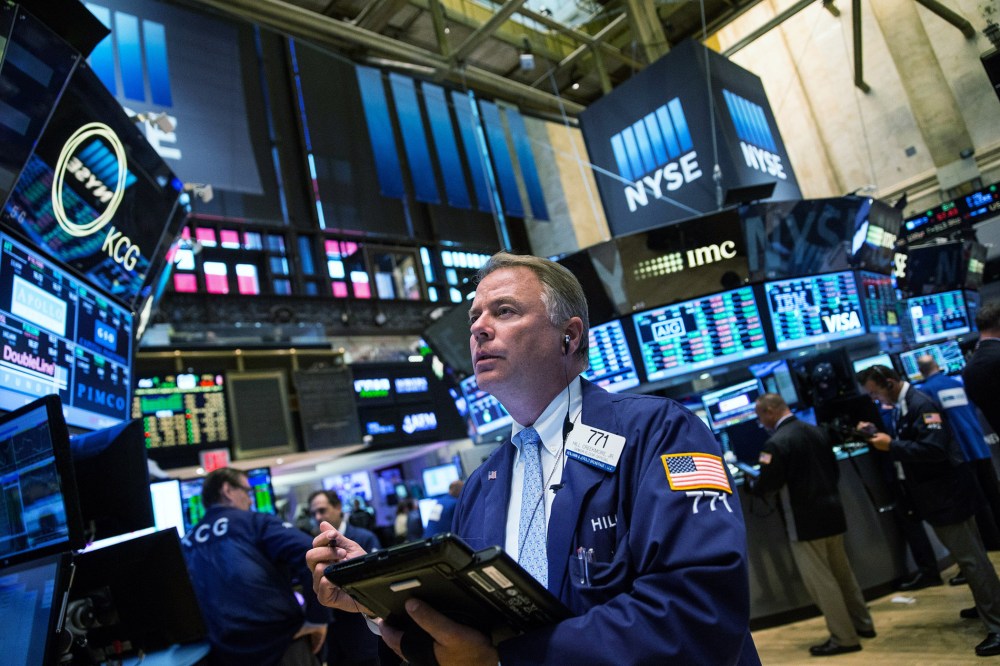 A trader works on the floor of the New York Stock Exchange during the afternoon of Sept. 8, 2015 in New York, N.Y. (Photo by Andrew Burton/Getty)