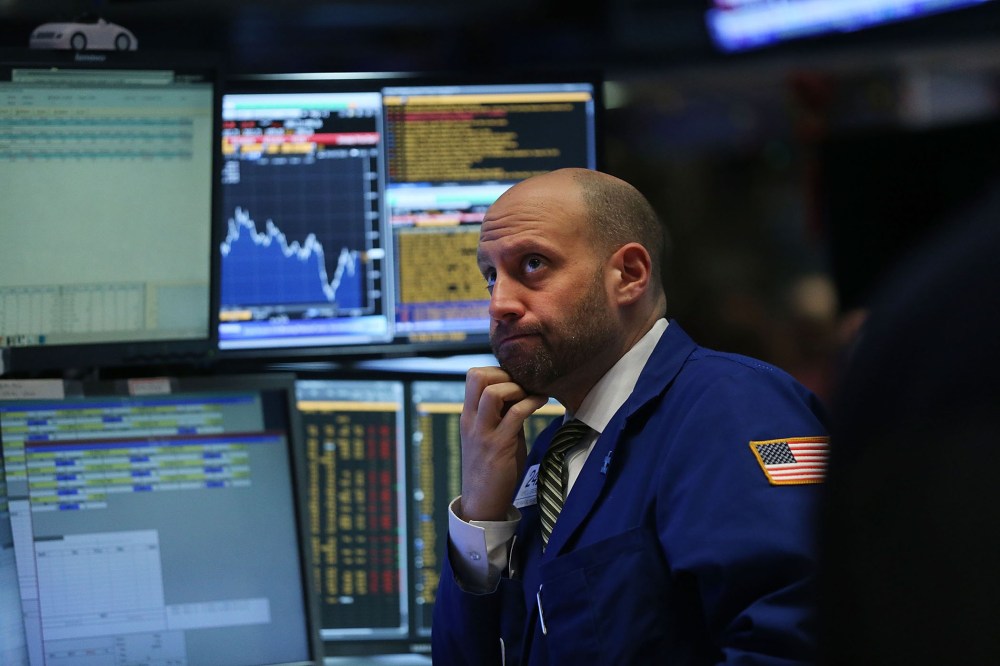 Traders work on the floor of the New York Stock Exchange (NYSE) on Jan. 7, 2016 in New York City. (Photo by Spencer Platt/Getty)