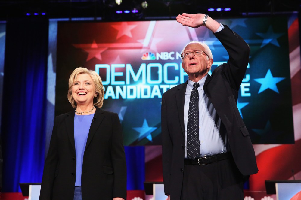 Candidates Hillary Clinton and Senator Bernie Sanders (I-VT) participate in the Democratic Candidates Debate hosted by NBC News and YouTube on Jan. 17, 2016 in Charleston, S.C. (Photo by Andrew Burton/Getty)