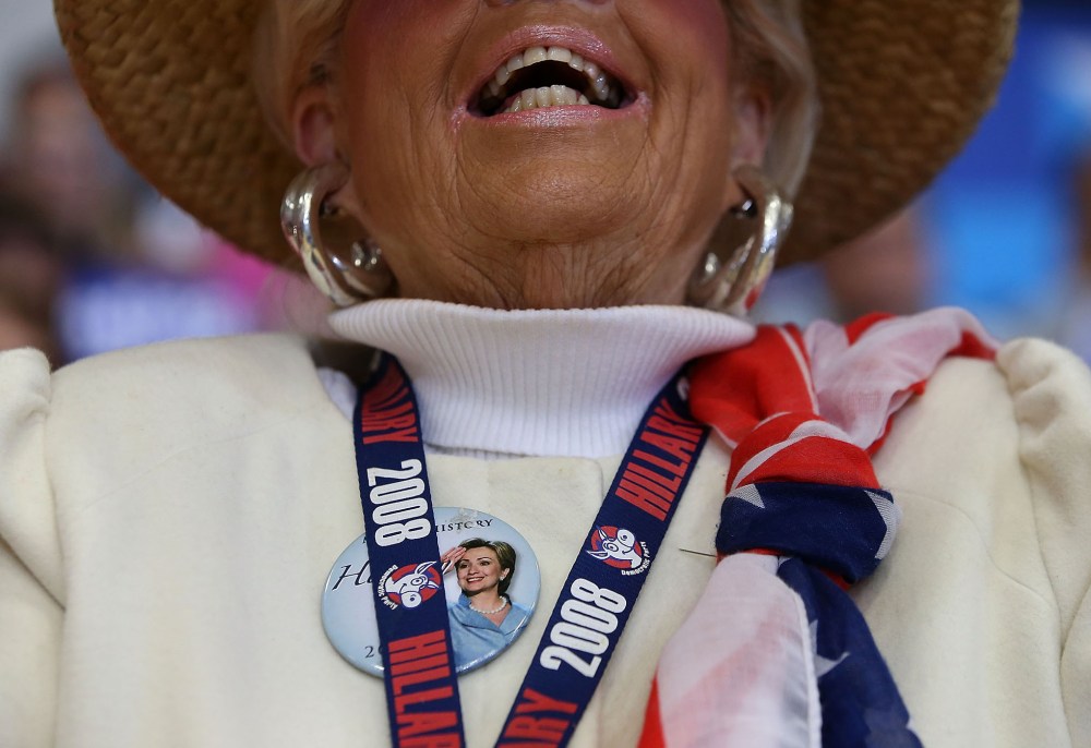 A supporter of democratic presidential candidate former Secretary of State Hillary Clinton cheers during a "get out to caucus" event at Washington High School on Jan. 30, 2016 in Cedar Rapids, Ia. (Photo by Justin Sullivan/Getty)