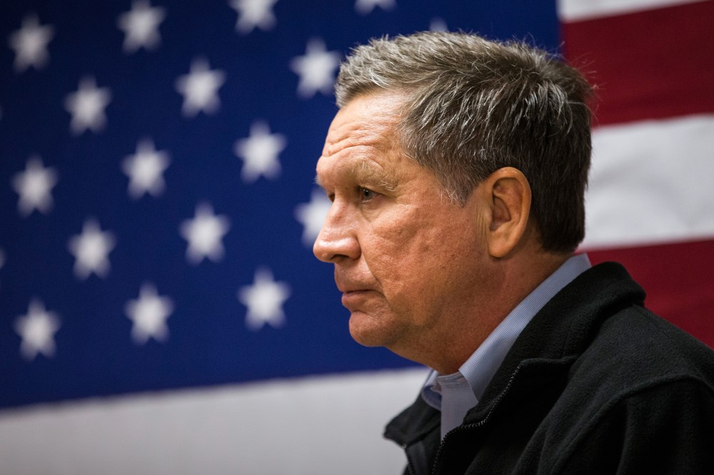 Republican presidential candidate Ohio Governor John Kasich speaks at a town hall meeting on Feb. 3, 2016 in Raymond, N.H. (Photo by Andrew Burton/Getty)