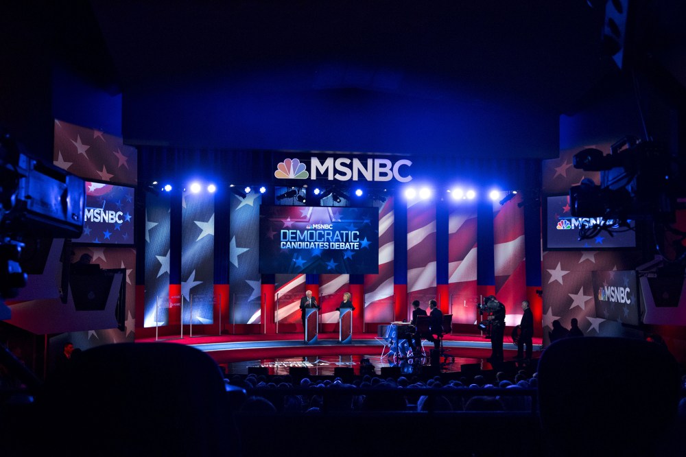 Hillary Clinton and Senator Bernie Sanders participate in the MSNBC Democratic presidential candidate debate at the University of New Hampshire in Durham, N.H., Feb. 4, 2016. (Photo by Andrew Harrer/Bloomberg/Getty)
