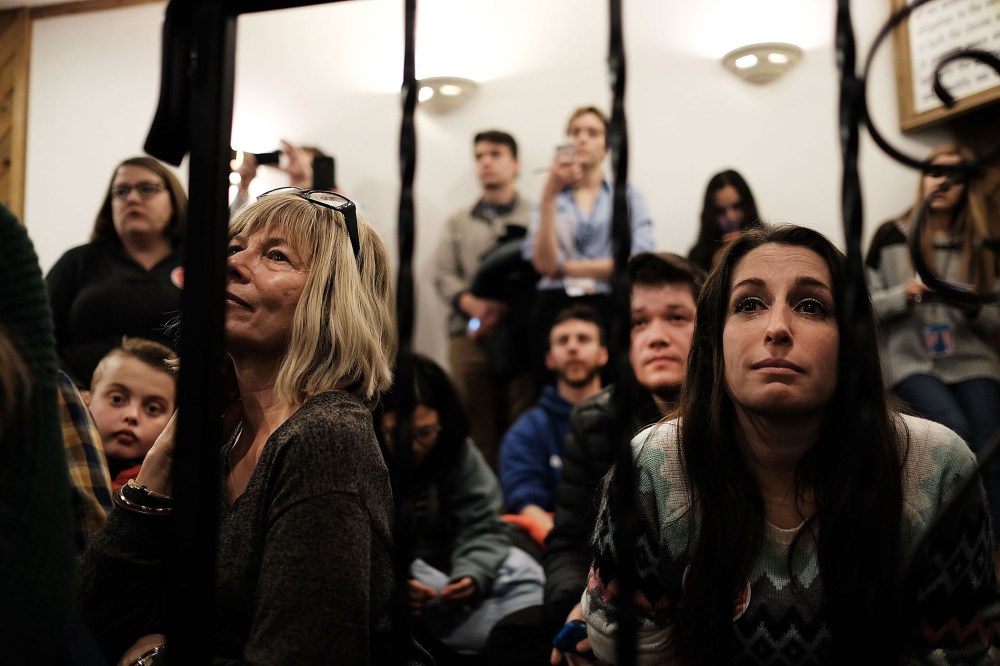 Voters watch Republican presidential candidate Ted Cruz speak at an American Legion on Feb. 8, 2016 in Manchester, N.H. (Photo by Spencer Platt/Getty)