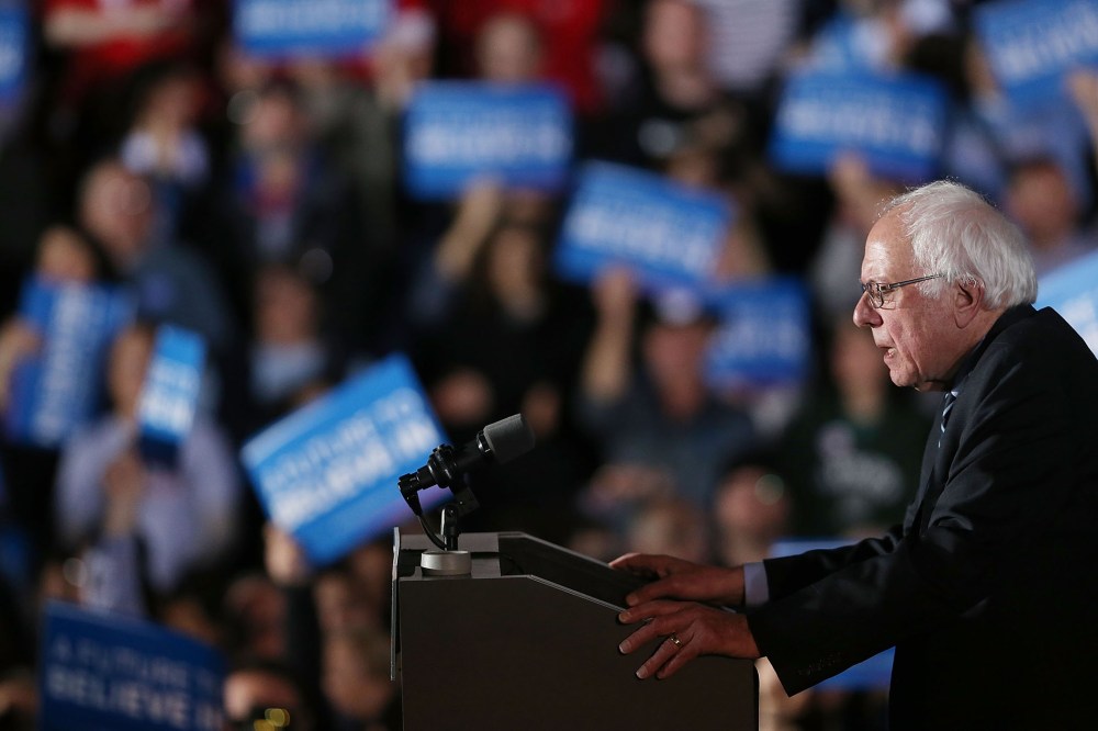 Sen. Bernie Sanders (D-VT) speaks on stage after declaring victory over Hillary Clinton in the New Hampshire Primary on Feb. 9, 2016 in Concord, N.H. (Photo by Spencer Platt/Getty)