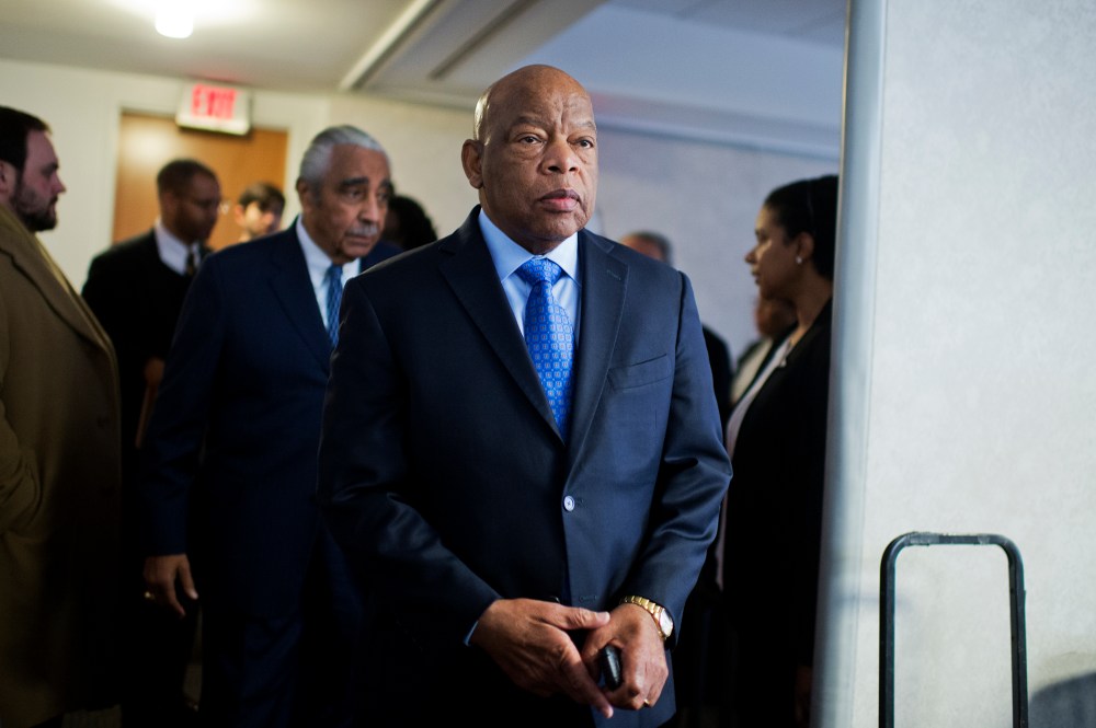 Rep. John Lewis and Rep. Charlie Rangel arrive for a news conference at the DNC where members of the Congressional Black Caucus PAC endorsed Hillary Clinton for president, Feb. 11, 2016. (Photo By Tom Williams/CQ Roll Call/Getty)