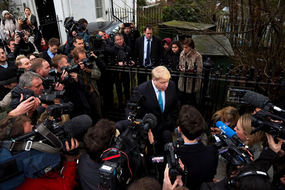 London Mayor Boris Johnson (C) delivers a statement to the media regarding his position on the forthcoming EU referendum outside his home in London on Feb. 21, 2016. (Photo by Niklas Halle'n/AFP/Getty)