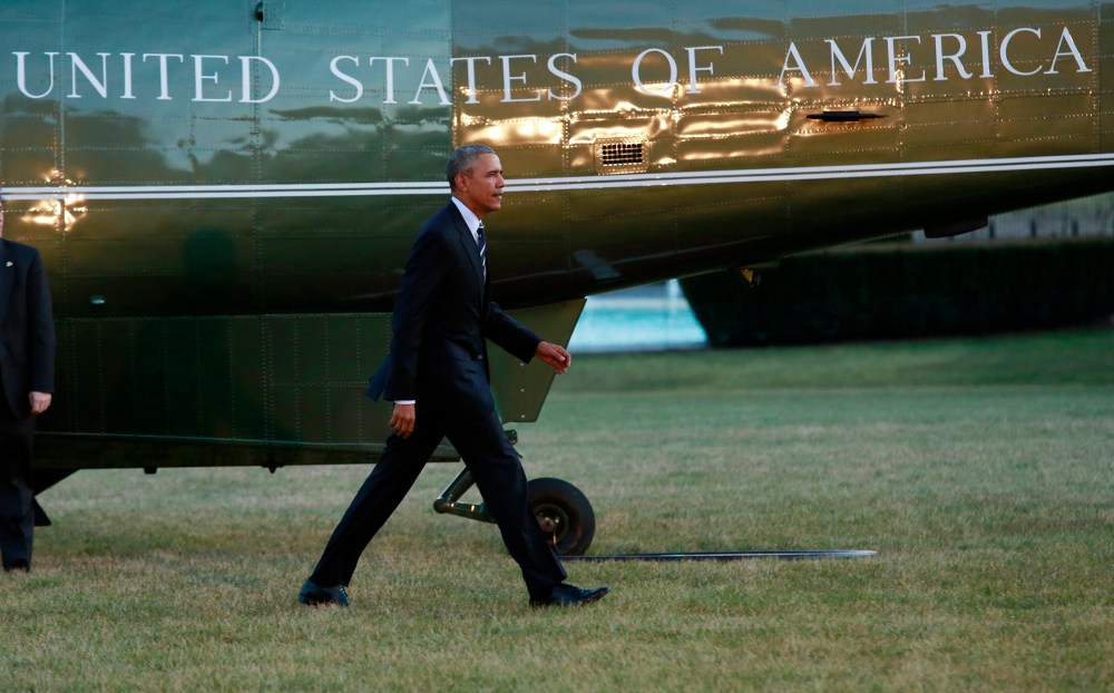U.S. President Barack Obama walks on the South Lawn of the White House in Washington after a one day trip to Jacksonville, Fl., Feb. 26, 2016. (Photo by Yuri Gripas/AFP/Getty)