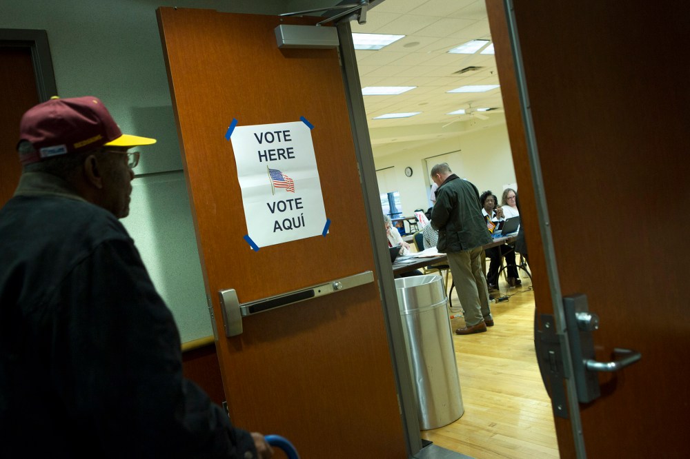 Voters prepare to cast their ballots in the presidential primary at the Herndon Community Center in Herndon, Va., on Super Tuesday, March 1, 2016. (Photo by Allison Shelley/For The Washington Post/Getty)