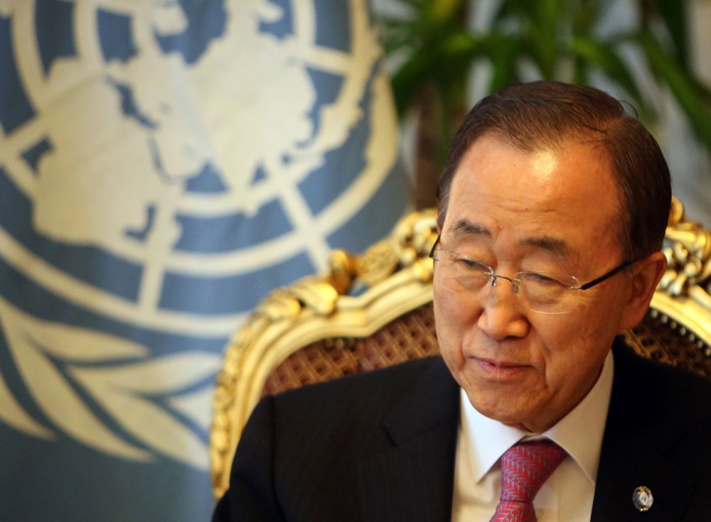 U.N. Secretary General Ban Ki-moon meets with Iraqi foreign minister upon his arrival at Baghdad International Airport on March 26, 2016. (Photo by Sabah Arar/AFP/Getty)