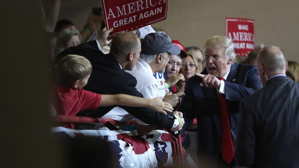 Republican Presidential nominee Donald Trump greets supporters after a campaign rally on Aug. 1, 2016 in Mechanicsburg, Pa. (Photo by John Moore/Getty)