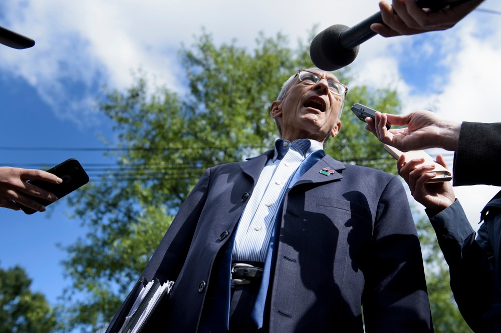 John Podesta, Clinton Campaign Chairman, talks to reporters as he walks to Democratic presidential nominee Hillary Clinton's Washington DC home, Oct. 5, 2016. (Photo by Brendan Smialowski/AFP/Getty)
