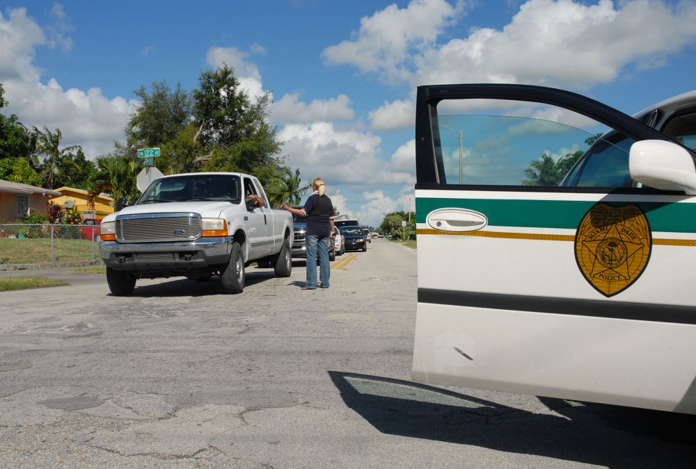 Police K-9 officers in the Cutler Bay neighborhood of Miami. (Photo by Edouard H.R. Gluck/Bloomberg News/Getty)