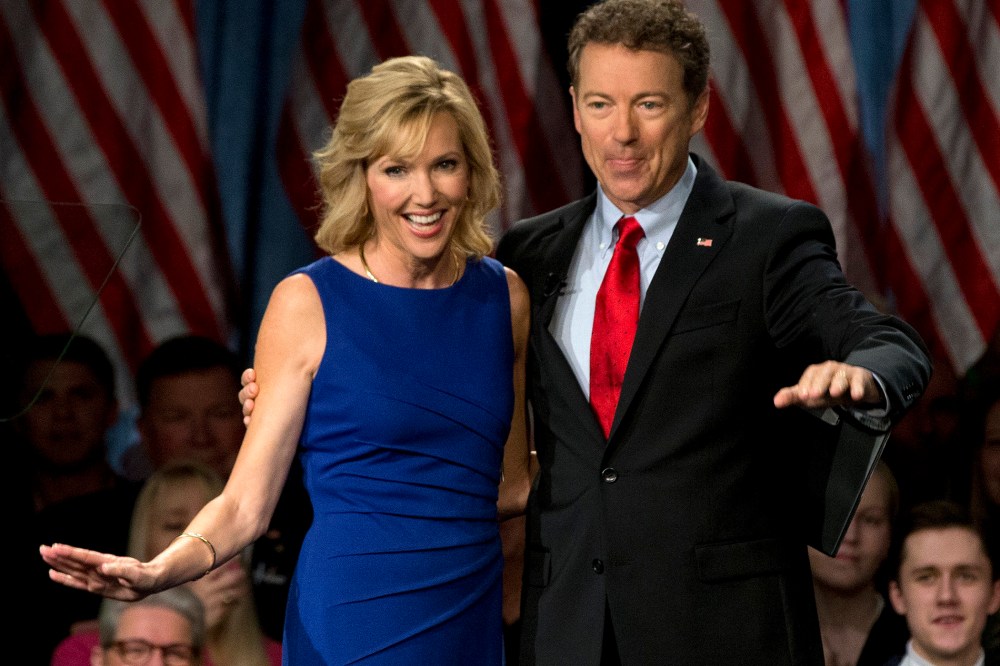 Sen. Rand Paul, R-Ky., joined by his wife Kelley Ashby, arrives to announce the start of his presidential campaign on April 7, 2015, in Louisville, Ky.