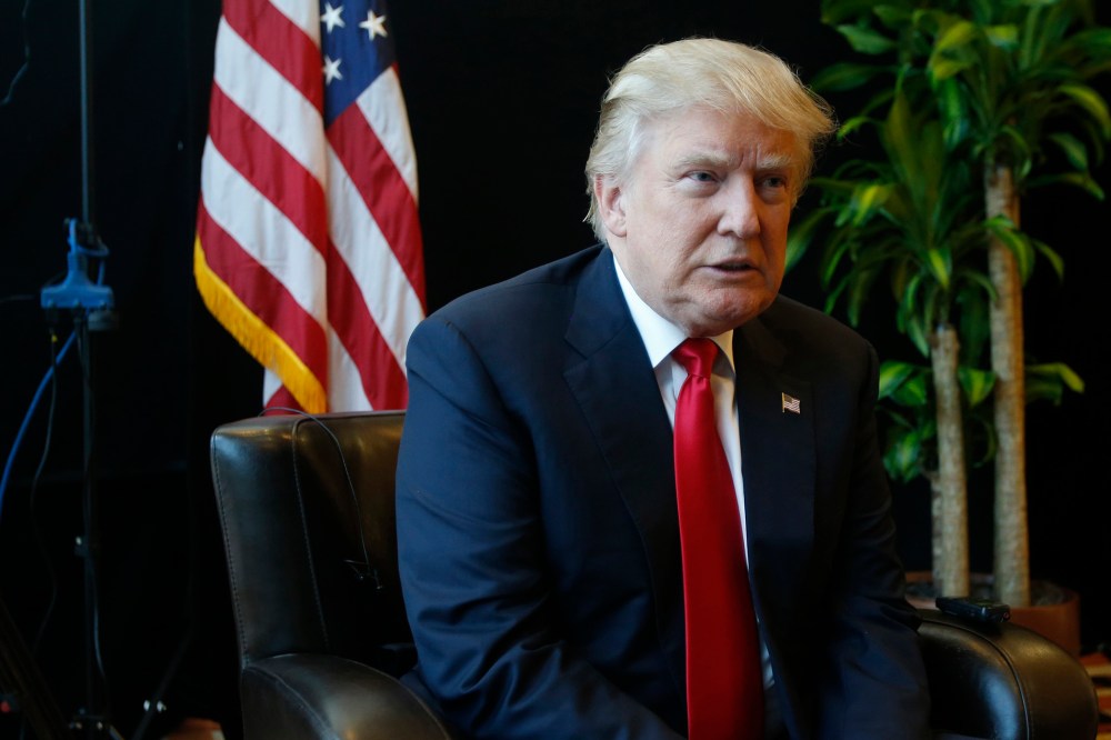 Republican Presidential candidate Donald Trump listens to a question during an interview after a rally in Virginia Beach, Va., July 11, 2016. (Photo by Steve Helber/AP)