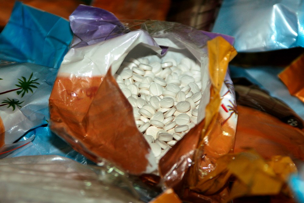 Bags containing pills called Captagon were found in a Beirut port on Nov. 26, 2007. (Photo by Nabil Mounzer/EPA)