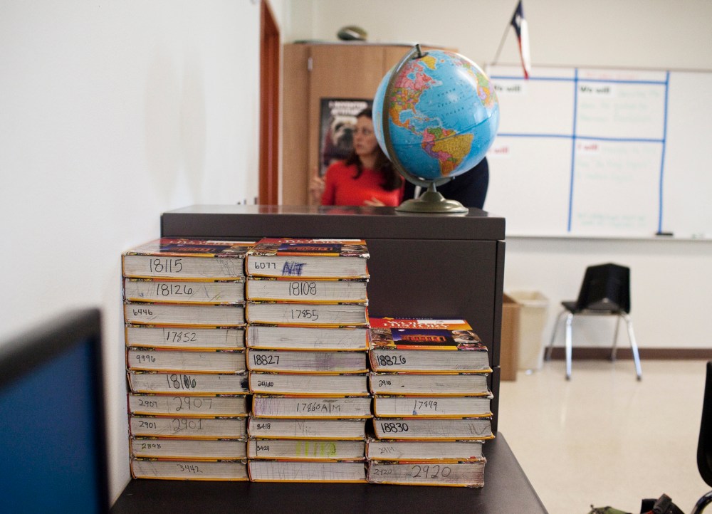 Textbooks, which are assigned and shared, in a classroom at Hutto High School in Hutto, Texas.