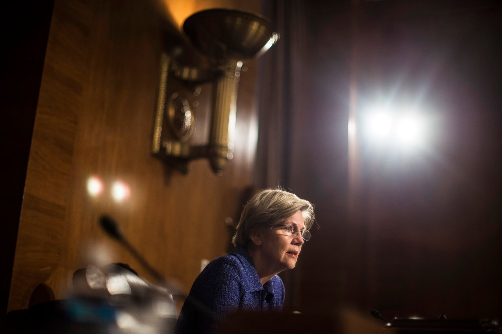 Sen. Elizabeth Warren (D-Mass.) speaks during a hearing on Capitol Hill in Washington, D.C., Nov. 12, 2013. (Photo by Gabriella Demczuk/The New York Times/Redux)