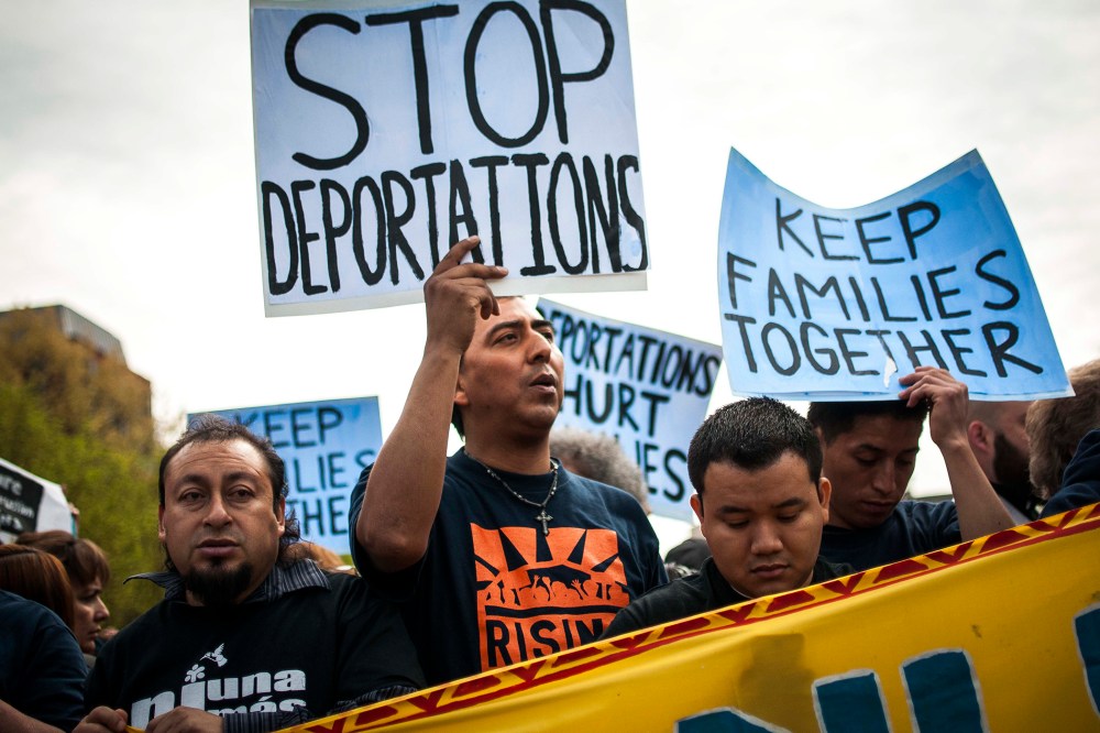 Demonstrators protest for immigration reform in front of the White House, April 28, 2014.