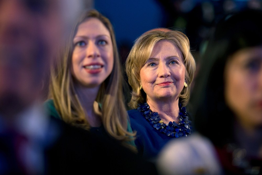 Former Secretary of State Hillary Rodham Clinton sits in the audience at a meeting during the Clinton Global Initiative in New York, Sept. 23, 2014. (Photo by Stephen Crowley/The New York Times/Redux)