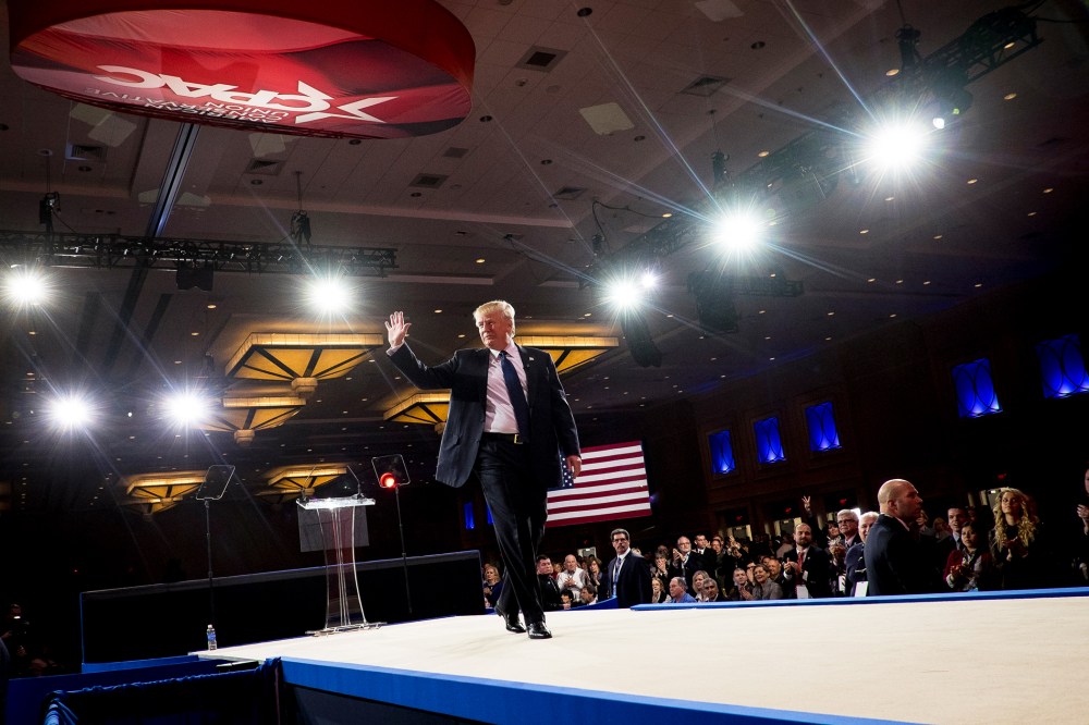 American businessman Donald Trump leaves the stage after addressing the American Conservative Union's 42nd Annual Conservative Political Action Conference (CPAC) in National Harbor, Md., on Feb. 27, 2015. (Photo by Pete Marovich/EPA)