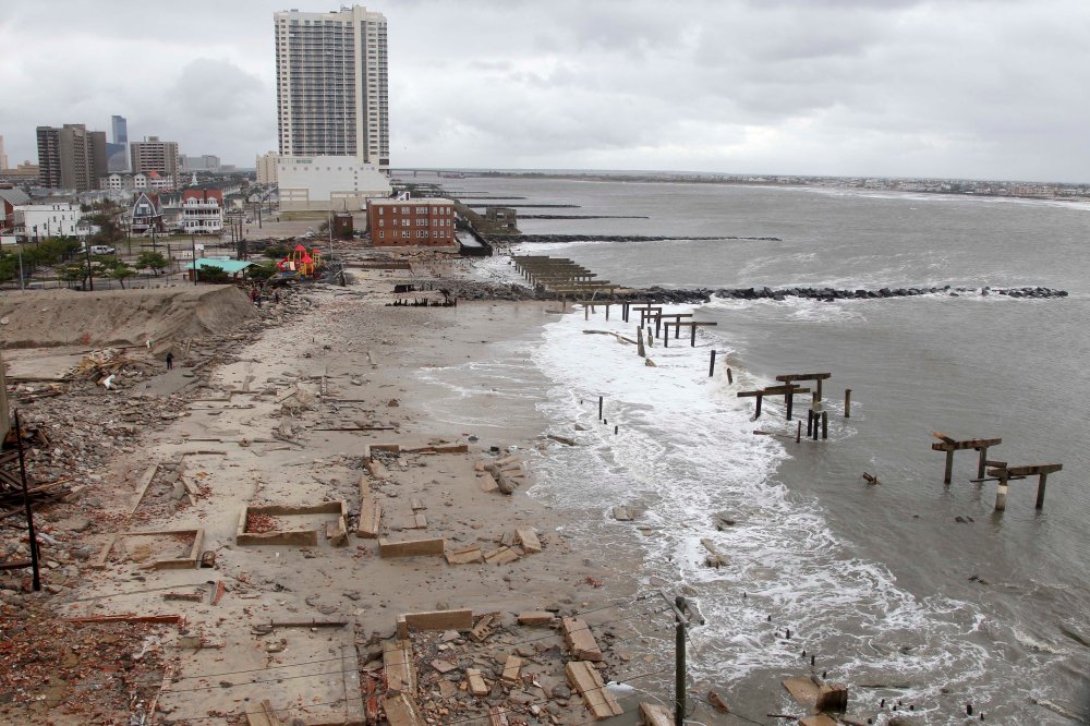 Foundations and pilings are all that remain of brick buildings and a boardwalk in Atlantic City, N.J., Tuesday, Oct. 30, 2012, after they were destroyed when a powerful storm that started out as Hurricane Sandy made landfall on the East Coast on Monday...