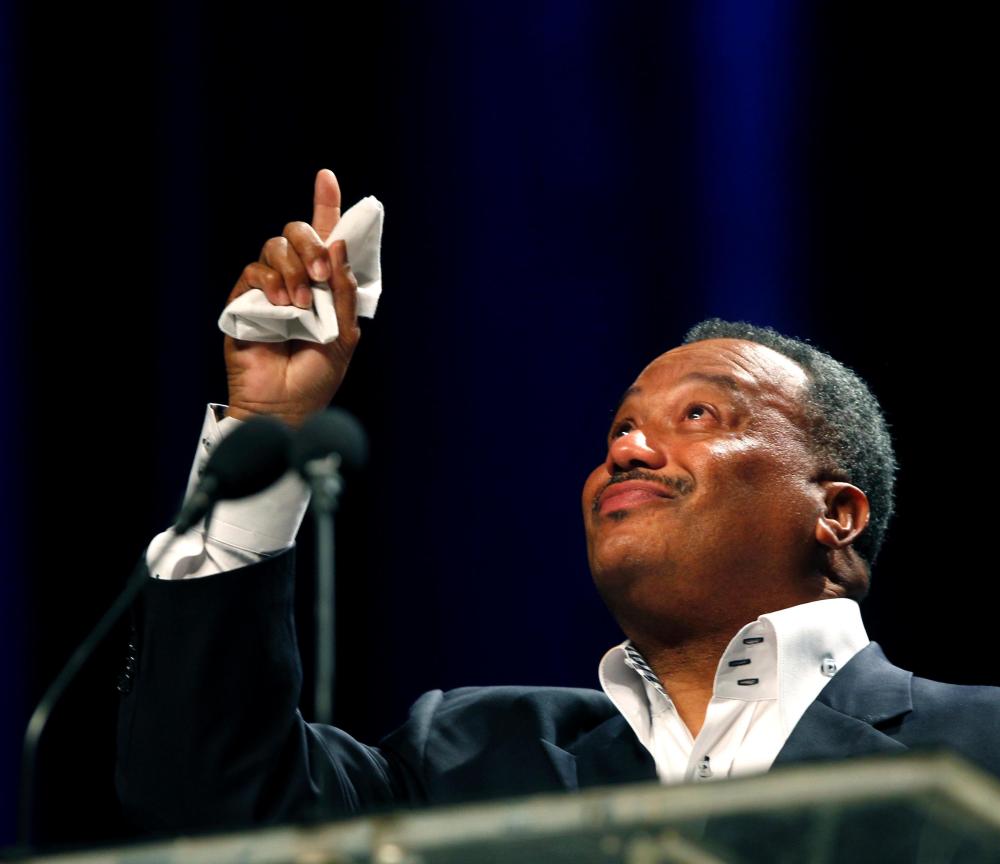 Rev. Fred Luter reacts after his election as president of the 167-year-old Southern Baptist Convention.