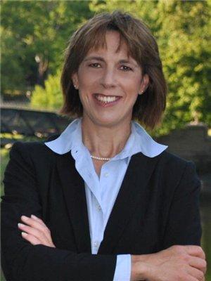 "...in addition to serving as vice president of the local school board, is also the vice president of the Golden Fleece Spinners and Weavers Guild."