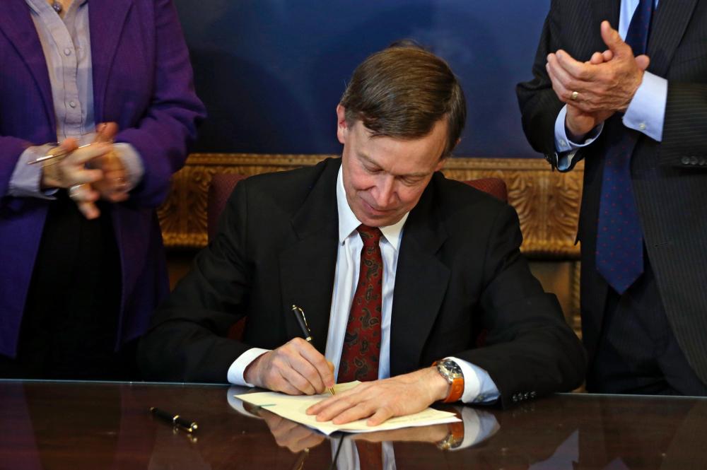 Colorado governor signs gun reform